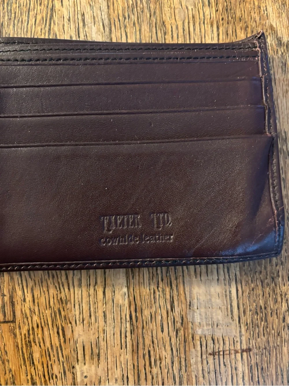 Four Vintage Black and Brown Leather Men's Wallets